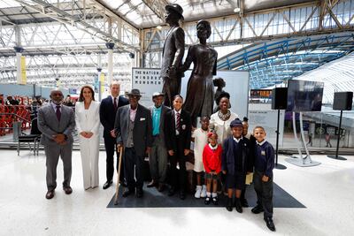 Britain's Prince William and his wife Kate at the National Windrush Monument at Waterloo Station in London, with Baroness Floella Benjamin and other guests. AFP