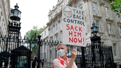 Mr Johnson faces widespread public outrage over his adviser's actions. AFP