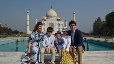 Prime Minister of Canada Justin Trudeau, his wife Sophie Gregoire and their children pose for a photograph during their visit to Taj Mahal on February 18, 2018. AFP