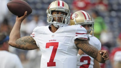 San Francisco quarterback Colin Kaepernick, carrying the new wave’s banner, tossed for 412 in Week 1. Denis Poroy / AP Photo