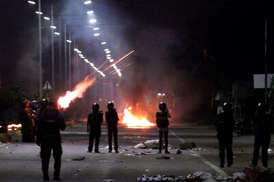 Security personnel fired tear gas at protesters near the family home of chief minister N Biren Singh, in Imphal in India's northeastern state of Manipur. AFP