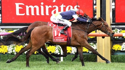 Jockey Kerrin McEvoy, riding Almandin, wins the Melbourne Cup ahead of Heartbreak City at Flemington Racecourse. Joe Castro / Reuters