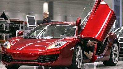 A McLaren MP4-12C on the production line in the UK. The vehicle pushes the extreme edge of what a street-legal car is capable of. Chris Ratcliffe / Bloomberg News