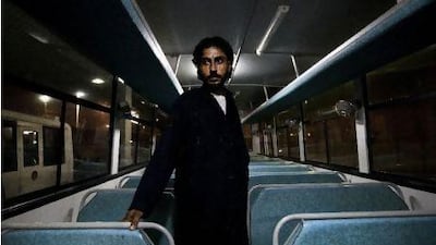 Mohammed Fayaz, a bus driver from Peshawar, Pakistan, often sleeps on his bus in Musaffah, but this night, even at 4am, it was just too hot and humid.