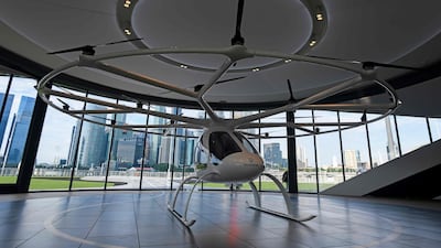 A Volocopter is displayed at the Voloport protoype launch pad in Marina Bay where the Volocopter unmanned air taxi transport test flight will take place during the 26th Intelligent Transport Systems World Congress (ITSWC) in Singapore. AFP