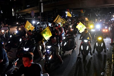 Supporters carry flags of Hezbollah as they rally on motorcycles to protest the Lebanese government's endorsement of a plan to disarm it, in the southern suburb of Beirut, Lebanon, 08 August 2025. Supporters of Hezbollah gathered to protest against the cabinet's decision to withdraw the militant group's weapons. EPA / WAEL HAMZEH