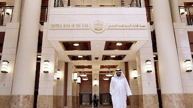 The UAE central bank says licensed financial institutions should adopt a documented governance framework for AI and machine-learning use. Ryan Carter / The National