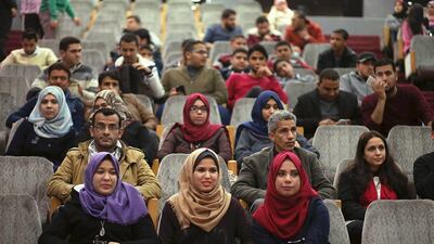 Palestinian spectators watch a movie at Red Crescent Society hall in Gaza City on February 25, 2016, enjoying their first night out at the movies since political tensions led to the torching of cinemas in the enclave 20 years ago. Mohammed Salem/ Reuters