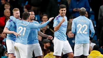 Rodri (2nd right) celebrates his goal. PA