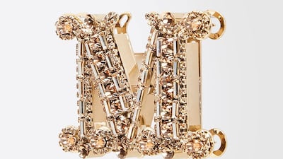Exclusive to the Middle East: rhinestone brooch, from Max Mara