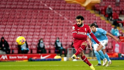 16. Salah scores from the penalty spot in the 4-1 defeat against Manchester City at Anfield. Getty
