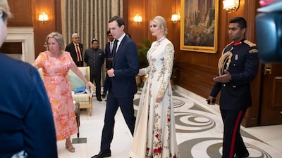 Ivanka Trump in an embroidered and flowing anarkali suit with a bandhgala collar is a design by New Delhi-designer Rohit Bal. AP