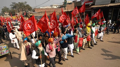 Mr Modi’s government has approved a bill to roll back the three contentious farm laws that triggered the country's longest street protests by farmers. AFP