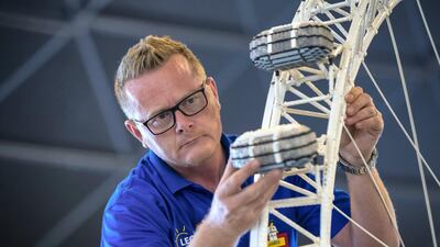 James Bailey works on the Ain Dubai wheel work in Miniland. Chris Whiteoak / The National
