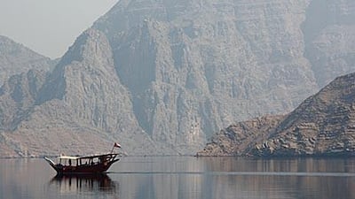 The rugged coastline of Musandam, Oman. Biosphere Expeditions is conducting diving conservation holidays to map out and study the marine life and coral in the waters off the peninsula.
