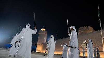 Performers participate in a show during the opening of Qasr Al Hosn.