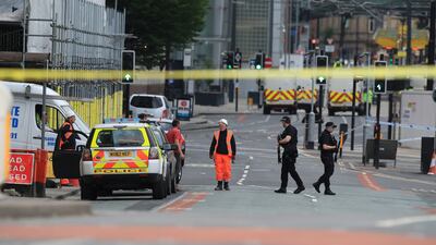Police at the scene of the Manchester Arena terror attack the morning after the incident in 2017. PA