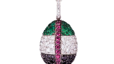 Faberge has crafted the Emirati flag into an egg-shaped pendant, with emeralds, white and black diamonds, and pink sapphires. Courtesy Faberge