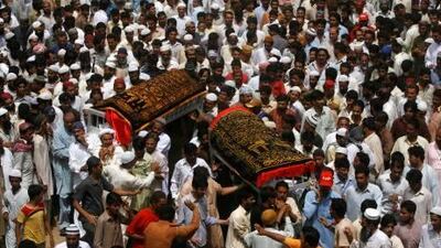 Ethnic violence in Karachi killed more people this year than all terrorist attacks across Pakistan. Above, mourners carry the coffins of Abdul Aziz and Muhammad Ayub, two brothers killed in August attacks.