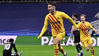 Ferran Torres runs off in celebration after scoring against Real Madrid. AFP