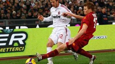 David Beckham, left, make his AC Milan debut against Roma at the Stadio Olimpico. His performance received average marks from the Italian press.