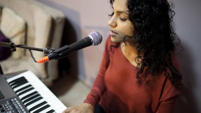 Indian singer Swapna Abraham, who lives in Dubai, will start a project in April 2017 to produce 1,000 songs in 1,000 as a lead up to Dubai Expo 2020. Anna Nielsen for The National