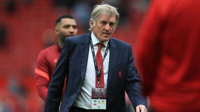 Former Liverpool star and manager Kenny Dalglish is on the pitch after the game. AFP