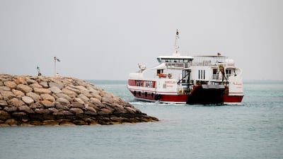 A ferry sails near the port after arriving from Delma Island in Abu Dhabi. Sarah Dea / The National