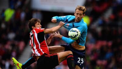 Santiago Vergini of Sunderland tussles with Peter Crouch of Stoke City during their Premier League match on Saturday in Sunderland. Nigel Roddis / Getty Images