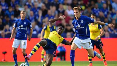 Arsenal's Yaya Sanogo lunges at the ball during his side's 1-1 draw with Leicester City on Sunday in the English Premier League. Carl Court / AFP / August 31, 2014