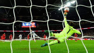 Wayne Rooney of England scores their second goal from the penalty spot during a Euro 2016 qualifying victory over Switzerland on Tuesday at Wembley. Mike Hewitt / Getty Images