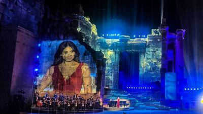 An image of Lebanese singer Hiba Tawwaji is projected onto the walls of the ruins of the Roman-era temple of Bacchus, as she performs during the Baalbeck International Festival in Lebanon. AFP