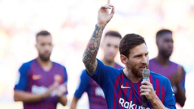Lionel Messi tells fans at the Camp Nou following a 3-0 win over Boca Juniors in the Gamper Trophy that winning the Champions League is the club's priority this season. EPA