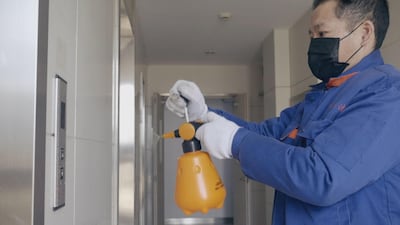 A cleaner at work in the Shanghai residential building. Courtesy Smithsonian Channel