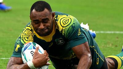 Tevita Kuridrani dives over for a try as Australia overcame a slow start to beat Uruguay 45-10. AFP