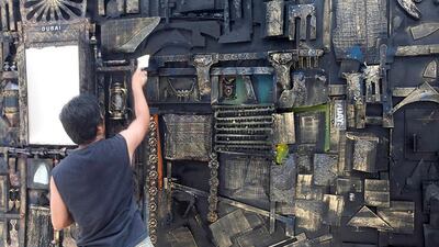 Darwin 'Japat' Guevarra, a highly regarded Filipino artist, creates a mixed media artwork that measures 9 meters by 3 meters. Japat painstakingly drew, cut out, rivited and painted each component which was then divided into seven parts and reconnected when put on display. The artwork was featured in the Outdoor Art Project 2012. Jeffrey E Biteng / The National