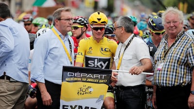 Team Sky rider and yellow jersey Chris Froome of Britain in action. Benoit Tessier / Reuters