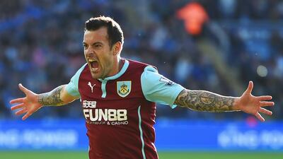 Ross Wallace of Burnley celebrates as he scores their second and equalising goal during a 2-2 draw with Leicester City on Saturday at the King Power Stadium in Leicester. Laurence Griffiths / Getty Images