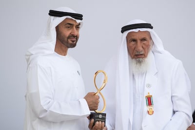 Sheikh Mohammed bin Zayed, Crown Prince of Abu Dhabi and Deputy Supreme Commander of the UAE Armed Forces, presents an Abu Dhabi Award to Ali bin Manea Al Ahbabi. Ryan Carter for the Crown Prince Court - Abu Dhabi
