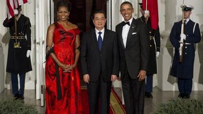 Michelle Obama, Hu Jintao and Barack Obama.