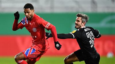 Bayern's Serge Gnabry sprints away from Fin Bartels of Holstein Kiel. Getty