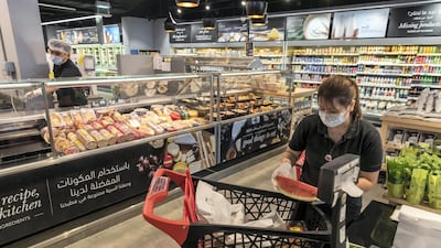 Nearly half of all UAE consumers are looking for ways to save money while shopping, according to a survey by McKinsey. Photo: Antonie Robertson / The National