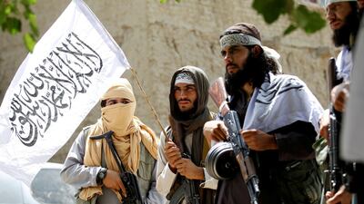 Taliban members walk as they celebrate a rare ceasefire in Ghanikhel district of Nangarhar province, Afghanistan on June 16, 2018. Reuters Photo