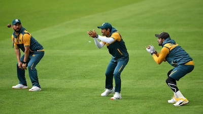 Yasir Shah, Asad Shafiq and and Babar Azam of Pakistan practice slip catching. Getty