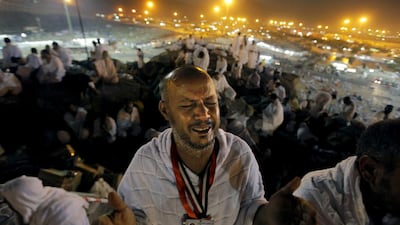 Pilgrims pray on the rocky slopes of the Mount of Mercy on the Plain of Arafat where, in the final year of his life, the Prophet Mohammed gave his famed Farewell Sermon in which he spoke about the equality of mankind, the rights of women and denounced extremism. Amr Nabil / AP Photo