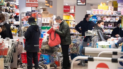 Roman citizens go to buy groceries at a supermarket in Rome, Italy. EPA
