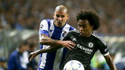 Chelsea midfielder Willian, right, pulled one back for his side on half-time but could not prevent defeat to Porto. Estela Silva / EPA