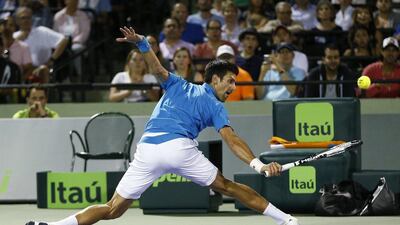 Novak Djokovic is two wins away from equalling Andre Agassi's record haul of six Miami Open titles. Joel Auerbach / AP Photo