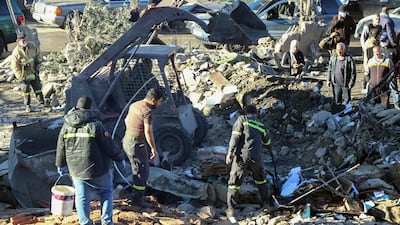 Rescuers search through the rubble of the Douris Civil Defence centre in Lebanon's Bekaa Valley on Friday. AFP