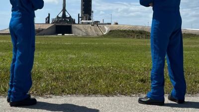Ms Al Matrooshi and Mr Al Mulla admire the views of the Space Launch System rocket at a launch pad in Florida's Kennedy Space Centre. Photo: Mr Al Mulla Instagram